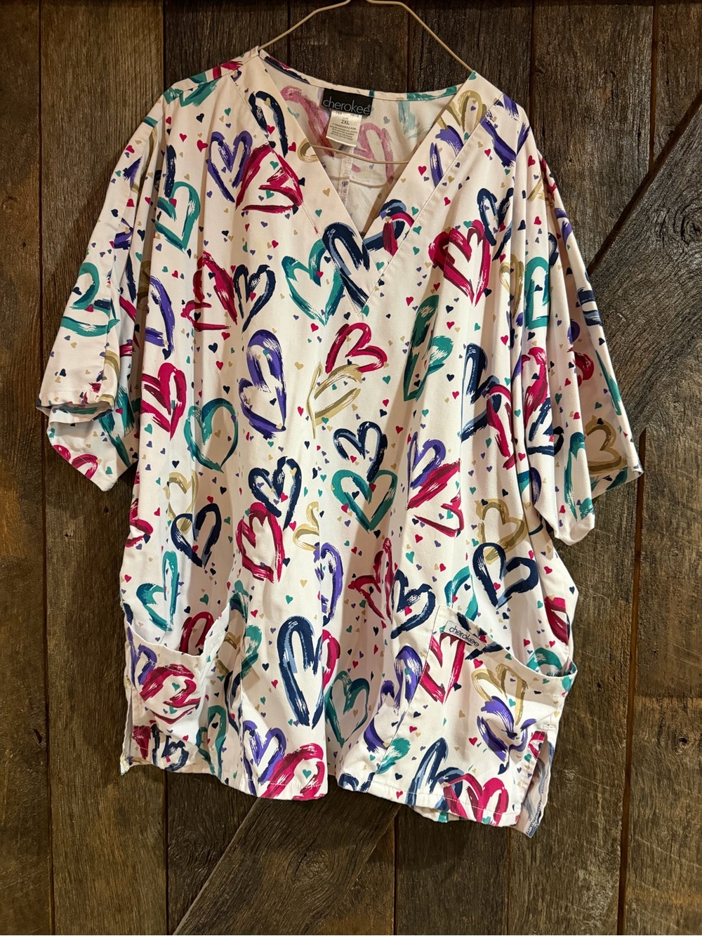 Cherokee White Scrub Top with Pink and Teal Heart Motif